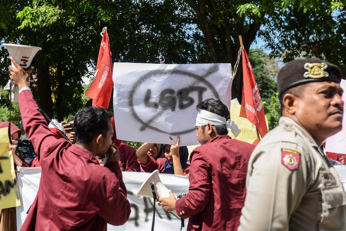 police detained transgender Aceh Indonesia
